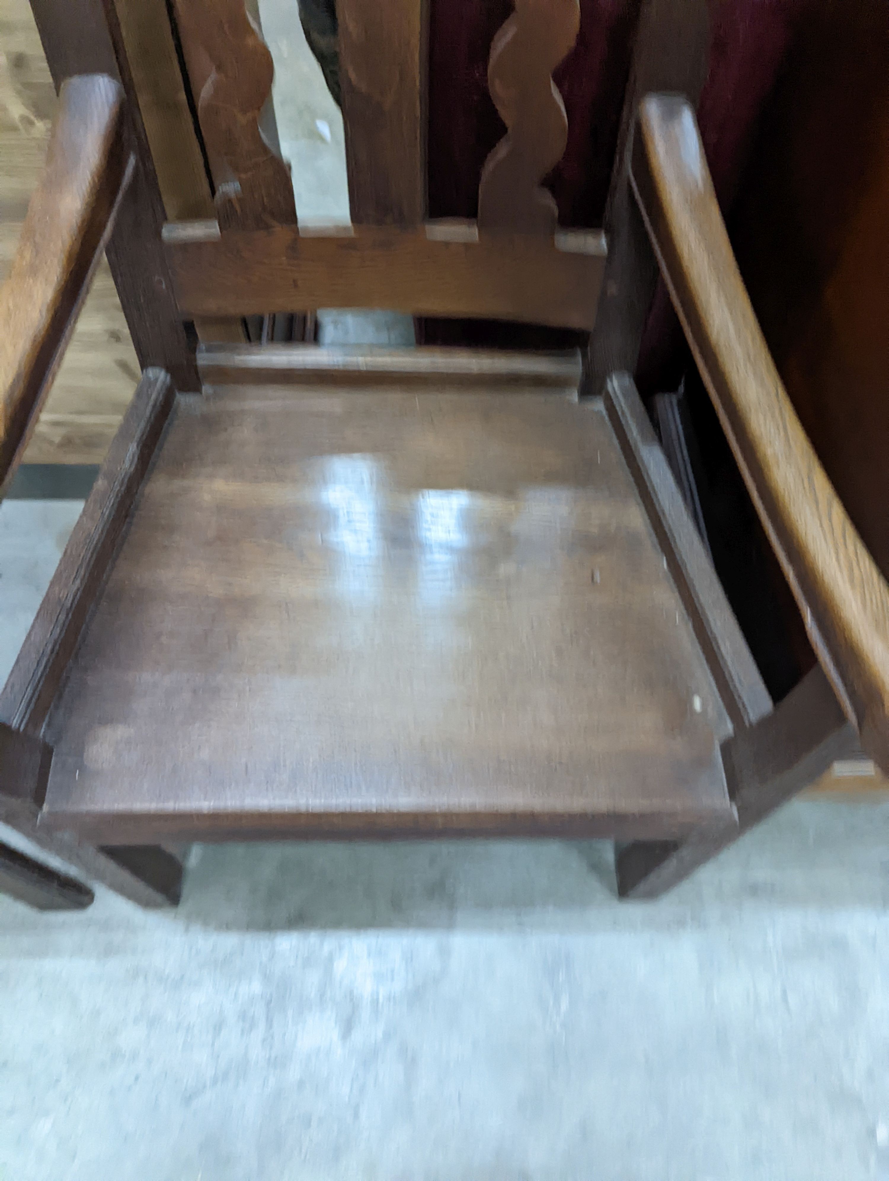 An Arts and Crafts elbow chair, width 61cm, depth 45cm, height 106cm